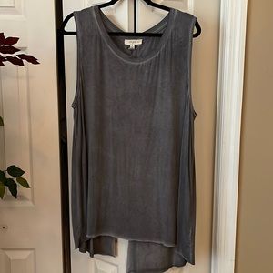 Adorable tank! Tie up back. Never been worn.